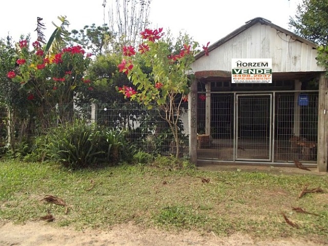 Casa à venda com 3 quartos, 100m² - Foto 1